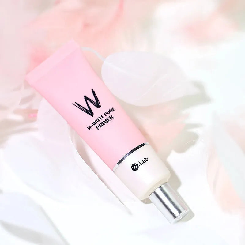 Pink cream before makeup face primer in tube packaging, brightening skin tone and creating invisible pores.