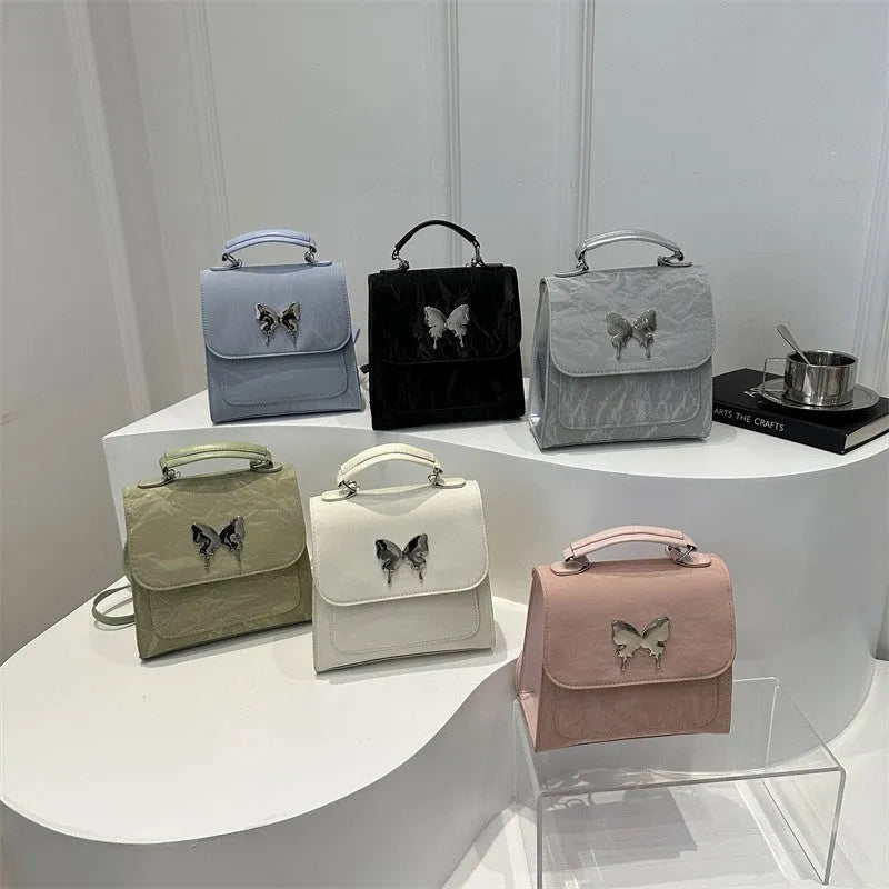 Women's preppy style PU backpack handbag with bow detail in choice of six colours