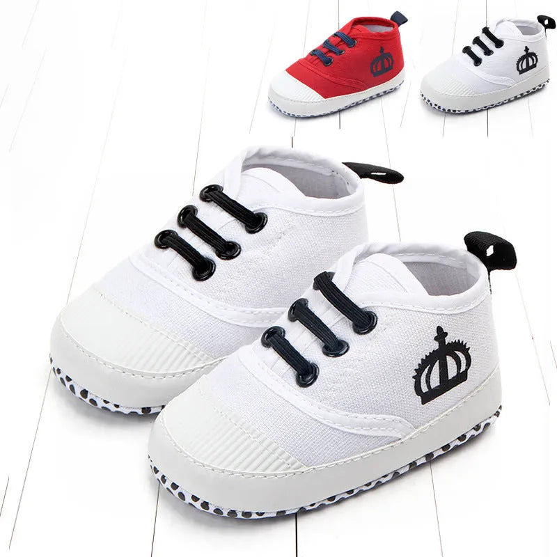 Red and white canvas toddler shoes with elastic band closure in three size options
