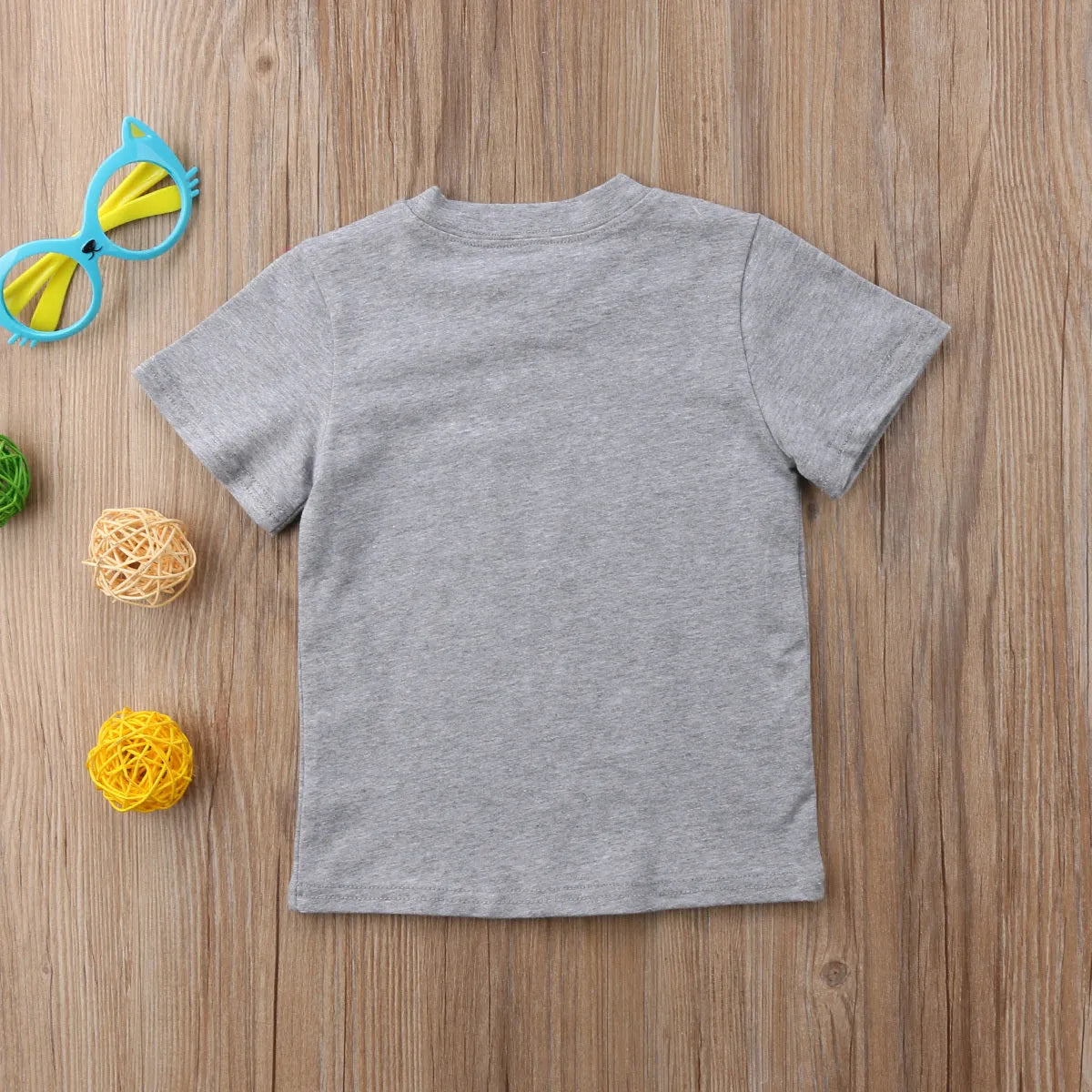 Grey printed cotton t-shirt showing sibling designs available in nine sizes from 60cm to 140cm