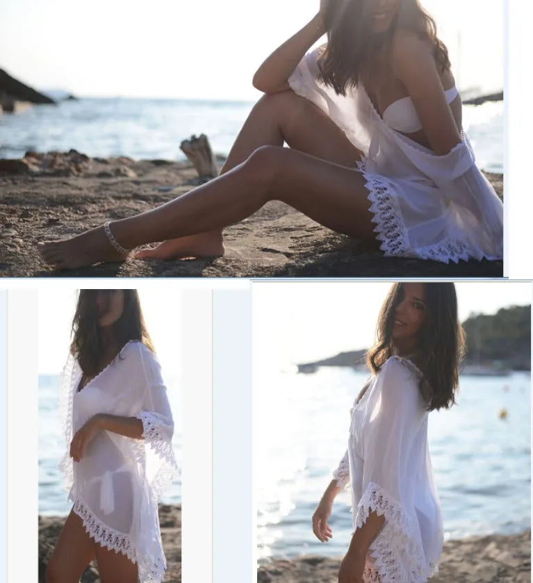 Tasselled beach coverup in cotton blend with loose fit and fringe trims on sleeves and hem