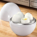 White microwave egg cooker steamer with capacity for four eggs, made from food grade plastic and aluminium.