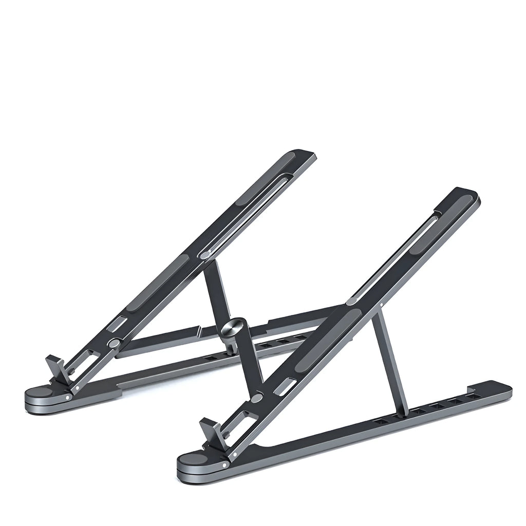 Foldable aluminium laptop stand in silver colour, shown adjusted to a height with a laptop on it