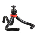 Black octopus-style flexible tripod with spherical gimbal head, shown wrapped around a pole.