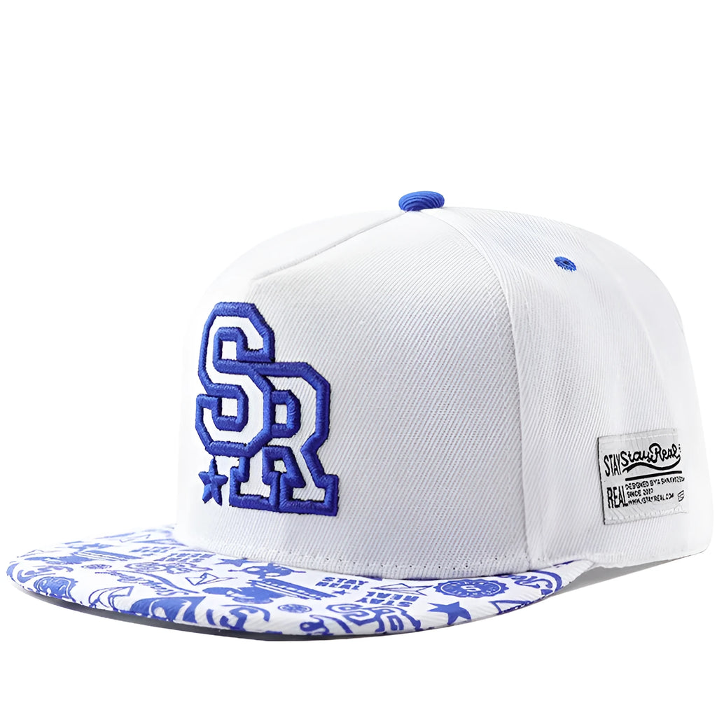 Cotton baseball cap with adjustable strap in black or white, showing embroidered letter detail on the front.