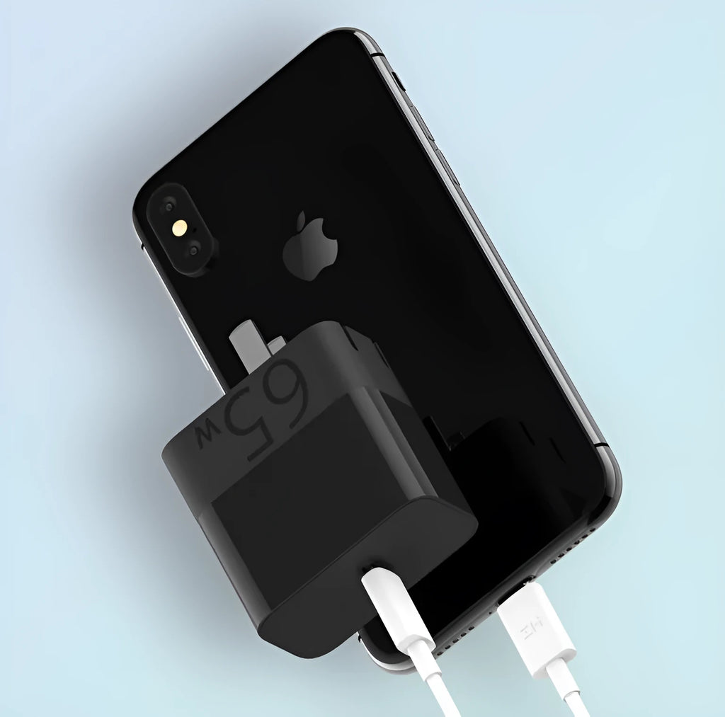 Black ZMI USB-C 65W compact notebook power adapter with folded plug.