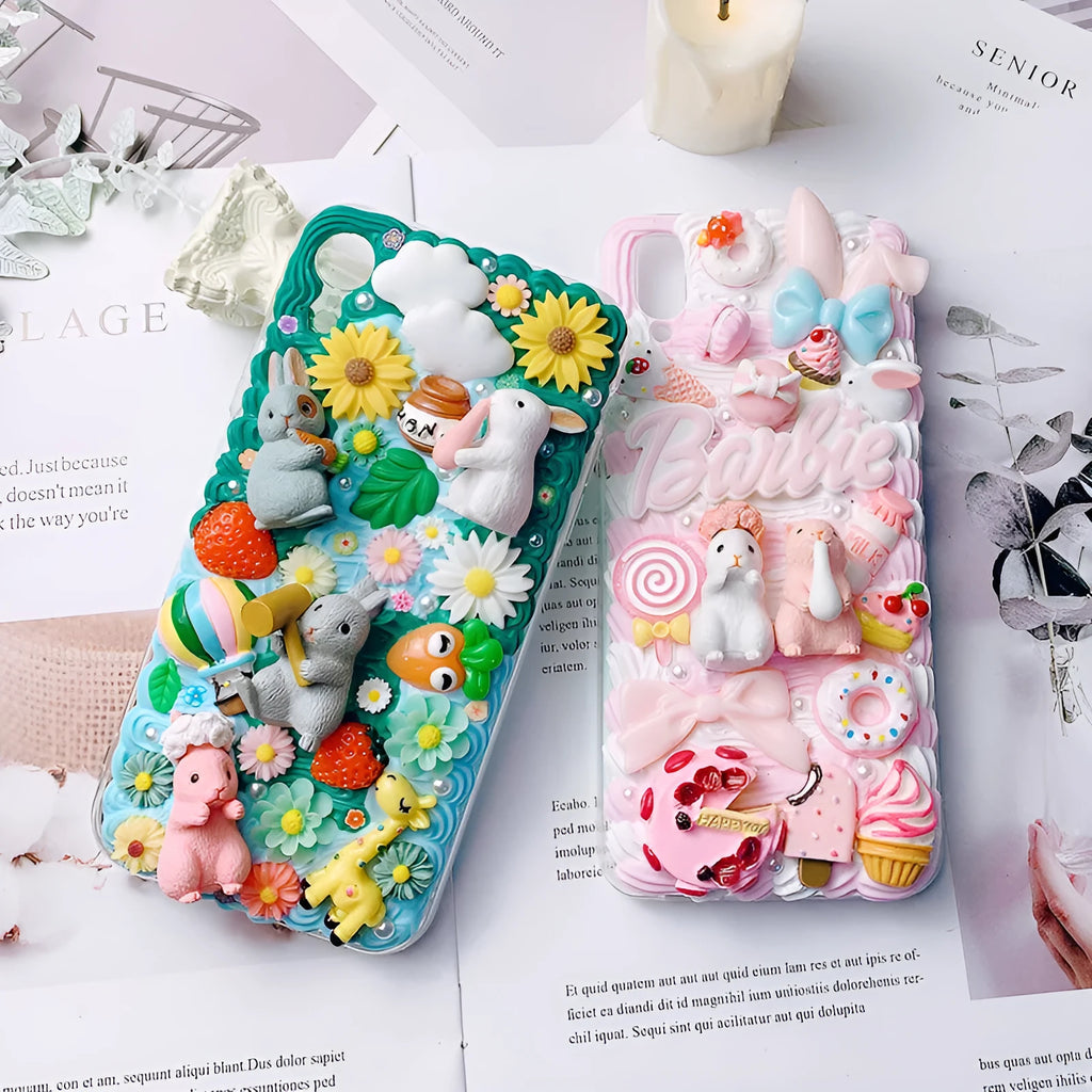 Pink and green 3D silicone phone cases with raised cartoon rabbit designs for iPhone.