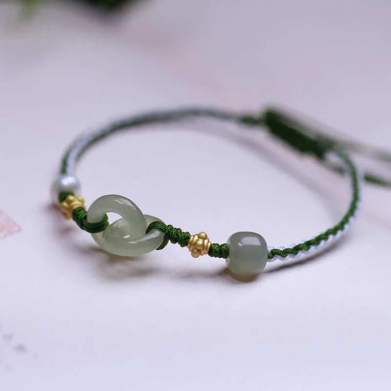 Natural Hetian jade woven bracelet with hollow-out design on flexible wire with silver or gold-plated elements