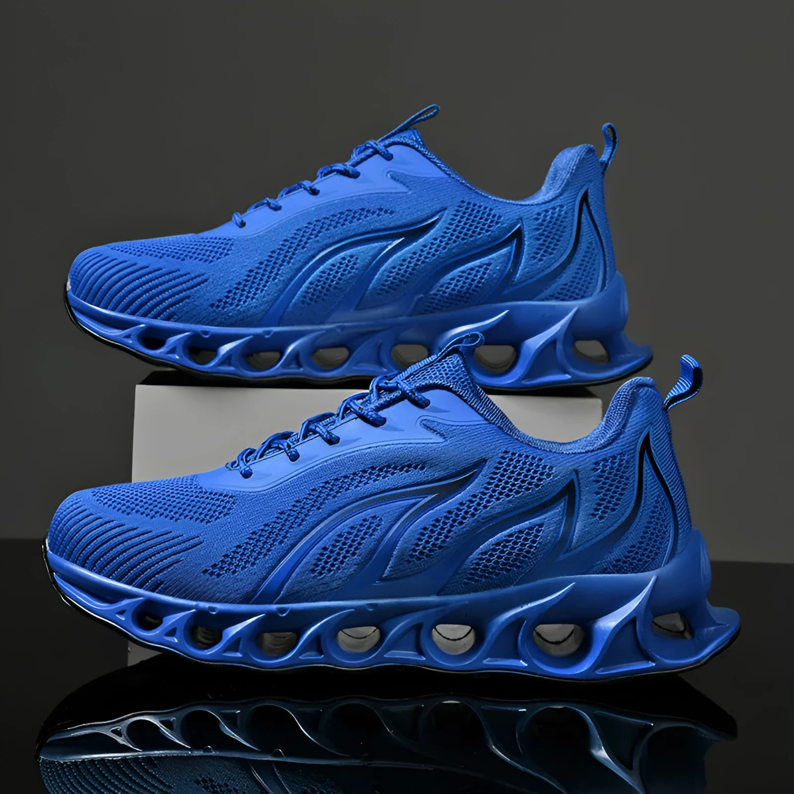 Men's sapphire blue sneakers with mesh upper, flame design, and white laces.