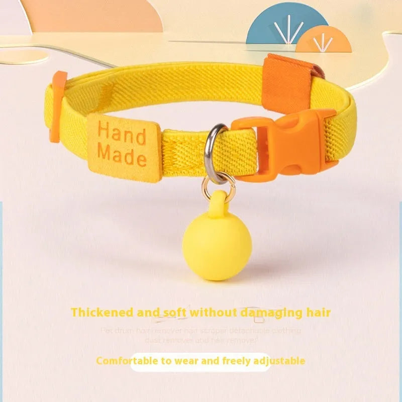 Yellow high elasticity polyester dog collar for small dogs on a white background.