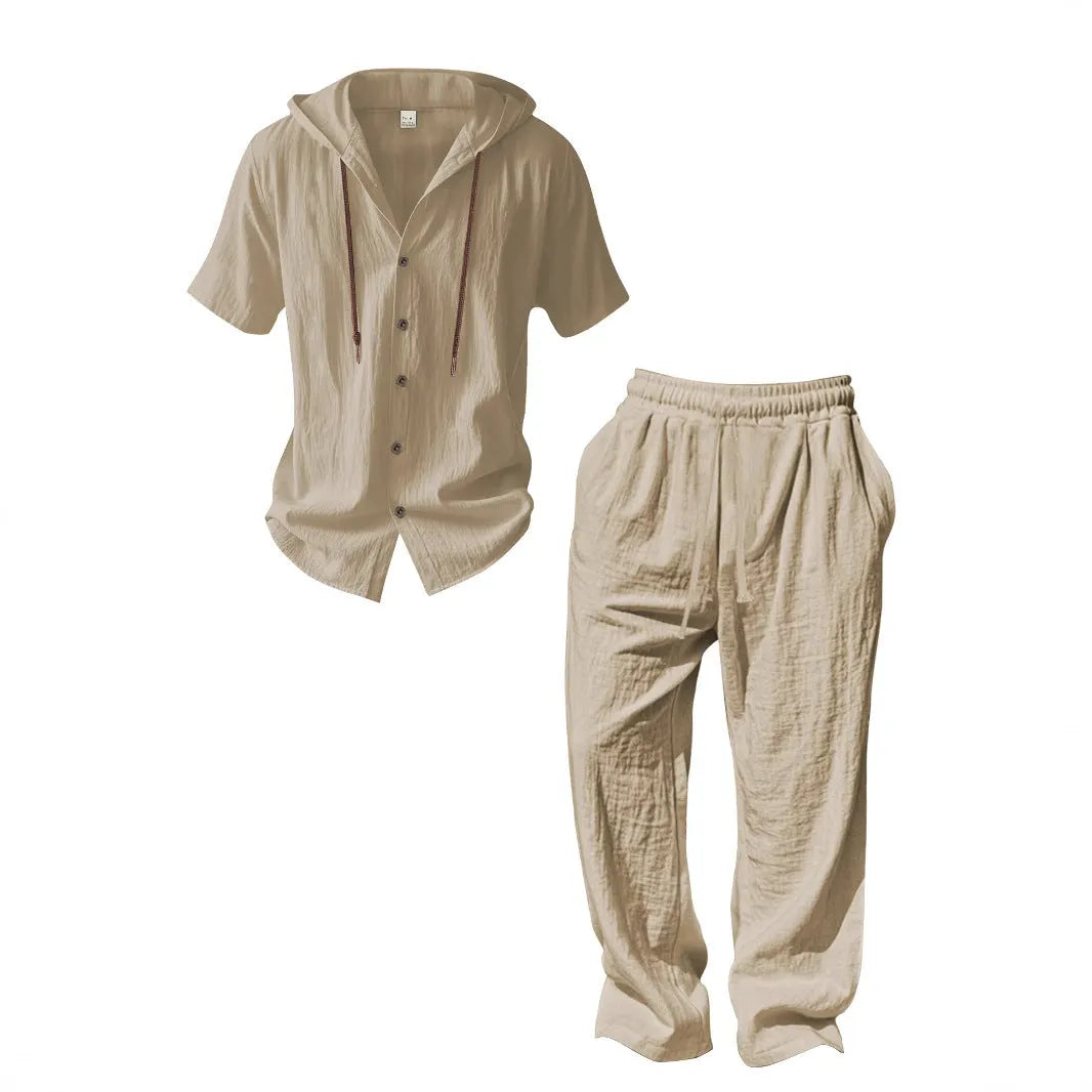 Men's casual cotton sports suit set with long sleeve top and trousers on a hanger.