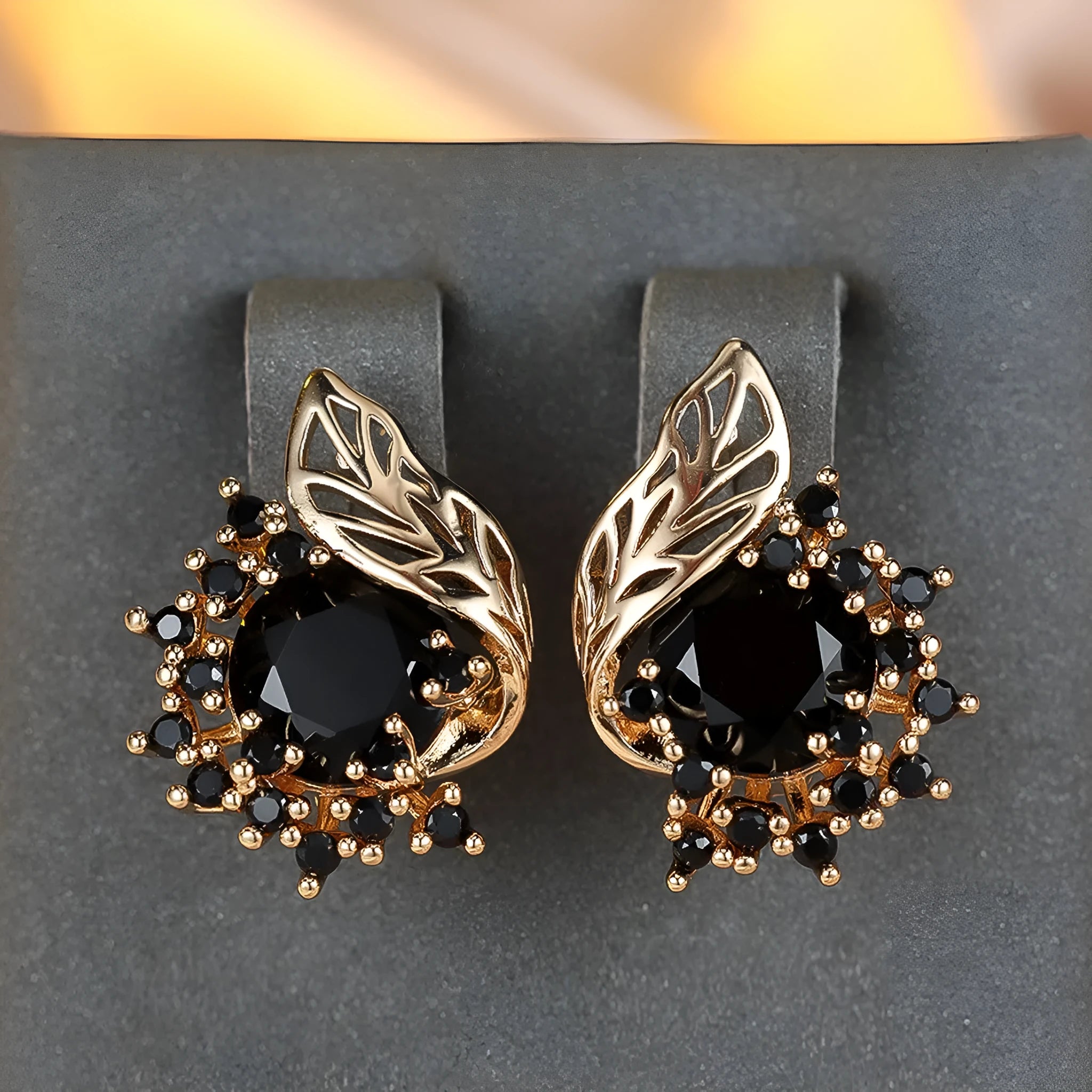 Round flower feather earrings with zircon stones in champagne gold finish, approximately 2-3cm diameter