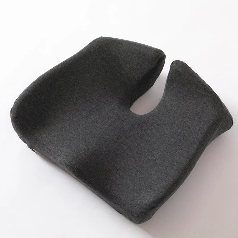 Memory foam office chair cushion in grey on desk chair