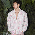 Men's pink floral long sleeve shirt with embossed pattern and loose fit.