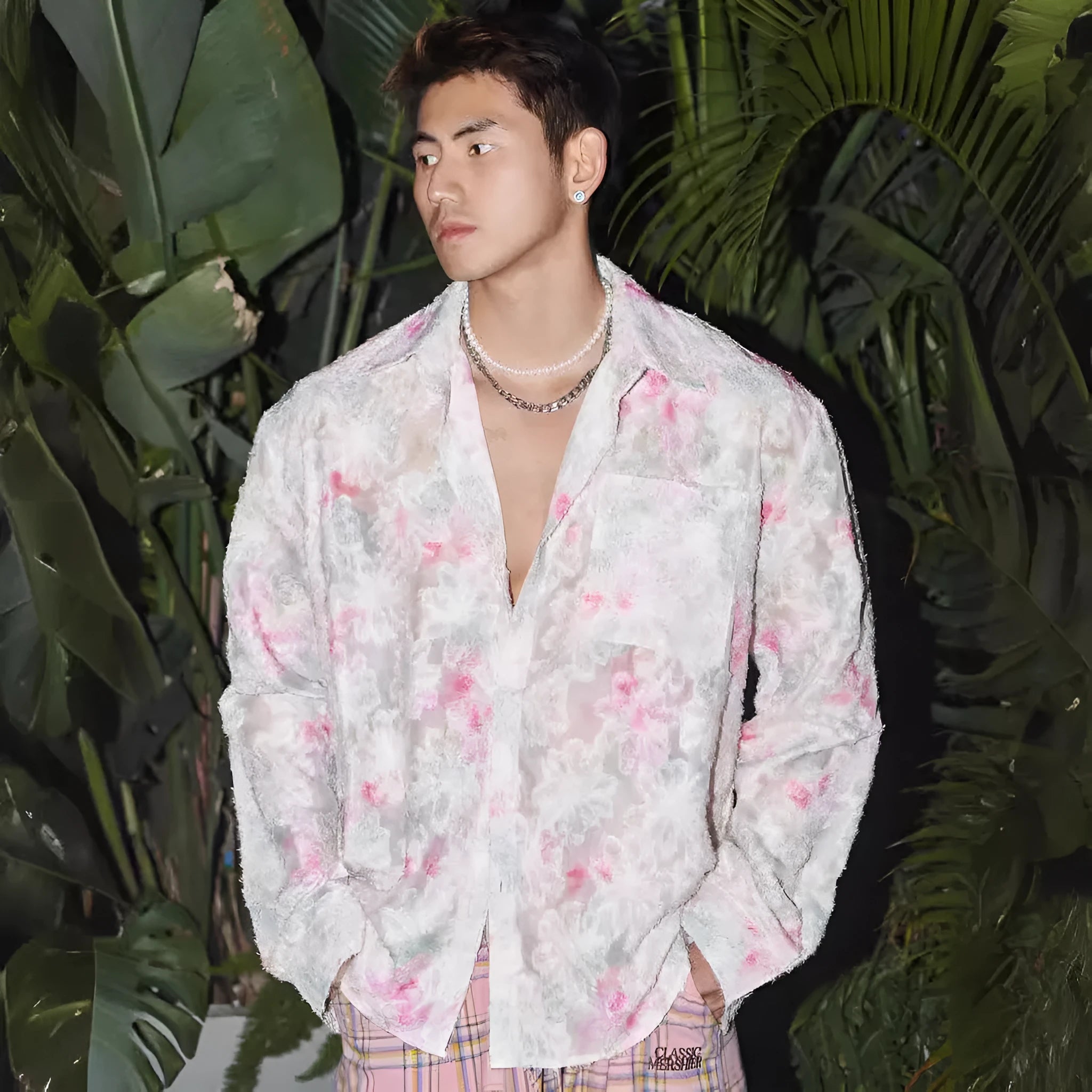 Men's pink floral long sleeve shirt with embossed pattern and loose fit.