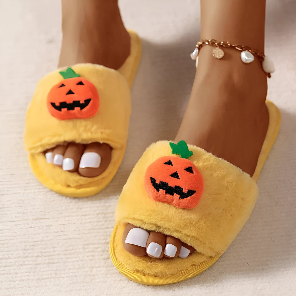 Pumpkin-themed plush slippers with open toe design and anti-slip PVC soles in white and yellow colour options
