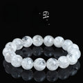 Crystal bracelet with natural blizzard pattern showing Ruyi and Xiangyun elements on round beads