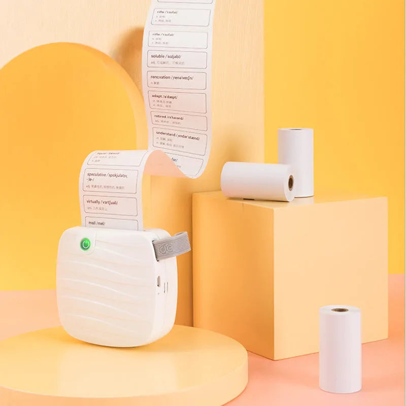 Three rolls of 57mm wide thermal paper in a box, for small printers.