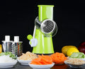 Blue manual round mandoline vegetable and cheese slicer with stainless steel blades.