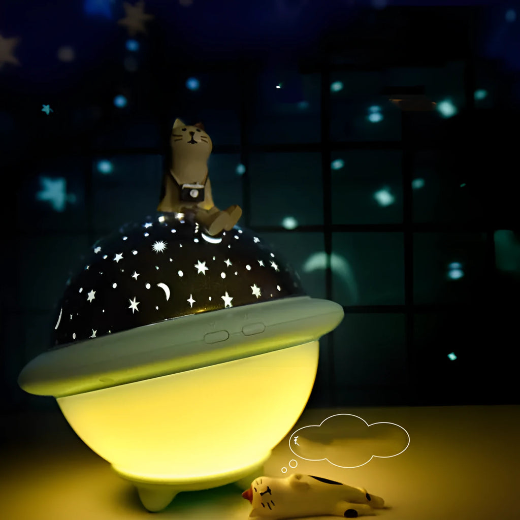 Green UFO-shaped starry sky projection lamp on a table with LED lights on