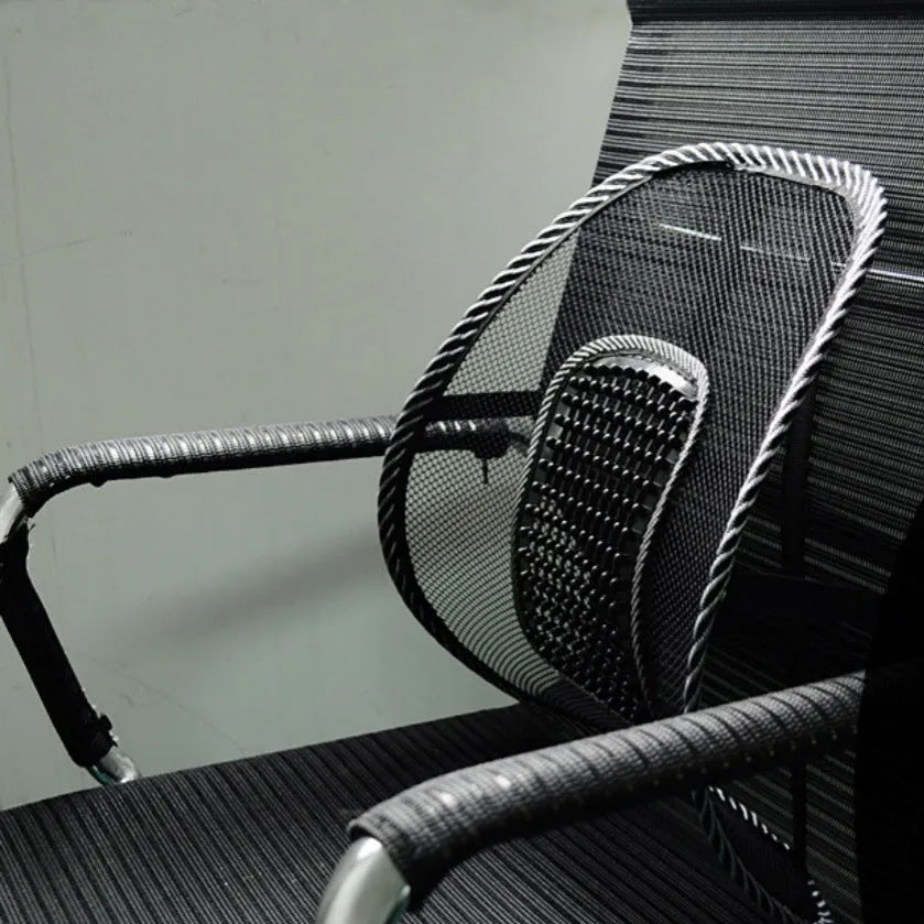 Black car lumbar support pillow with steel wire frame showing adjustable bending