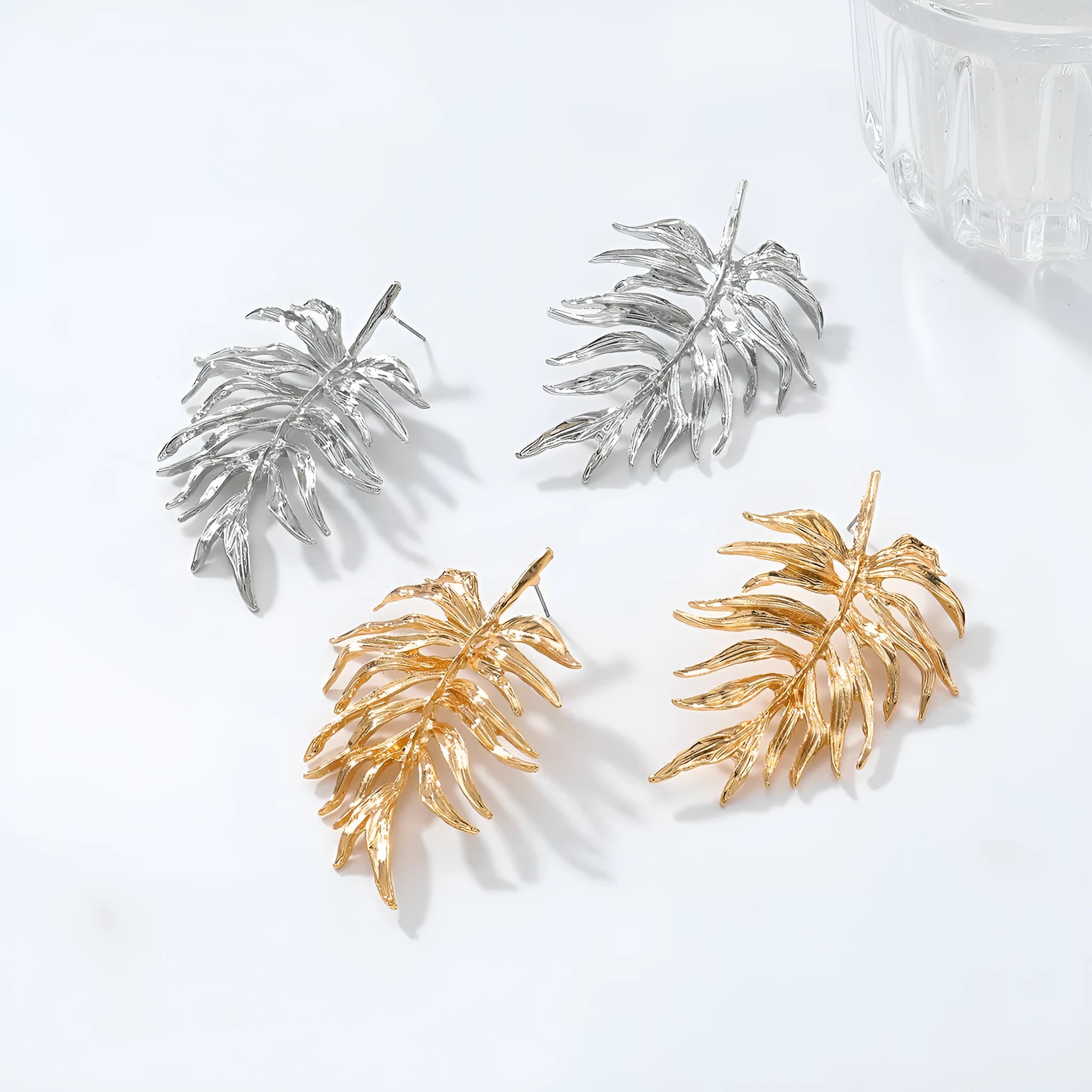 Gold and silver leaf-shaped geometric earrings for women made from zinc alloy affordable luxury style