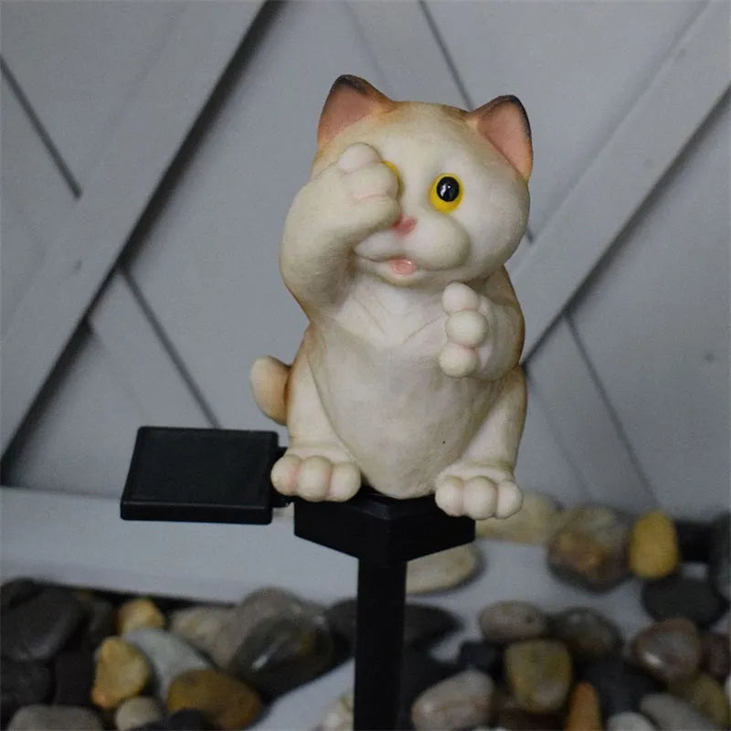 Brown cat-shaped solar-powered lawn light for garden decoration.