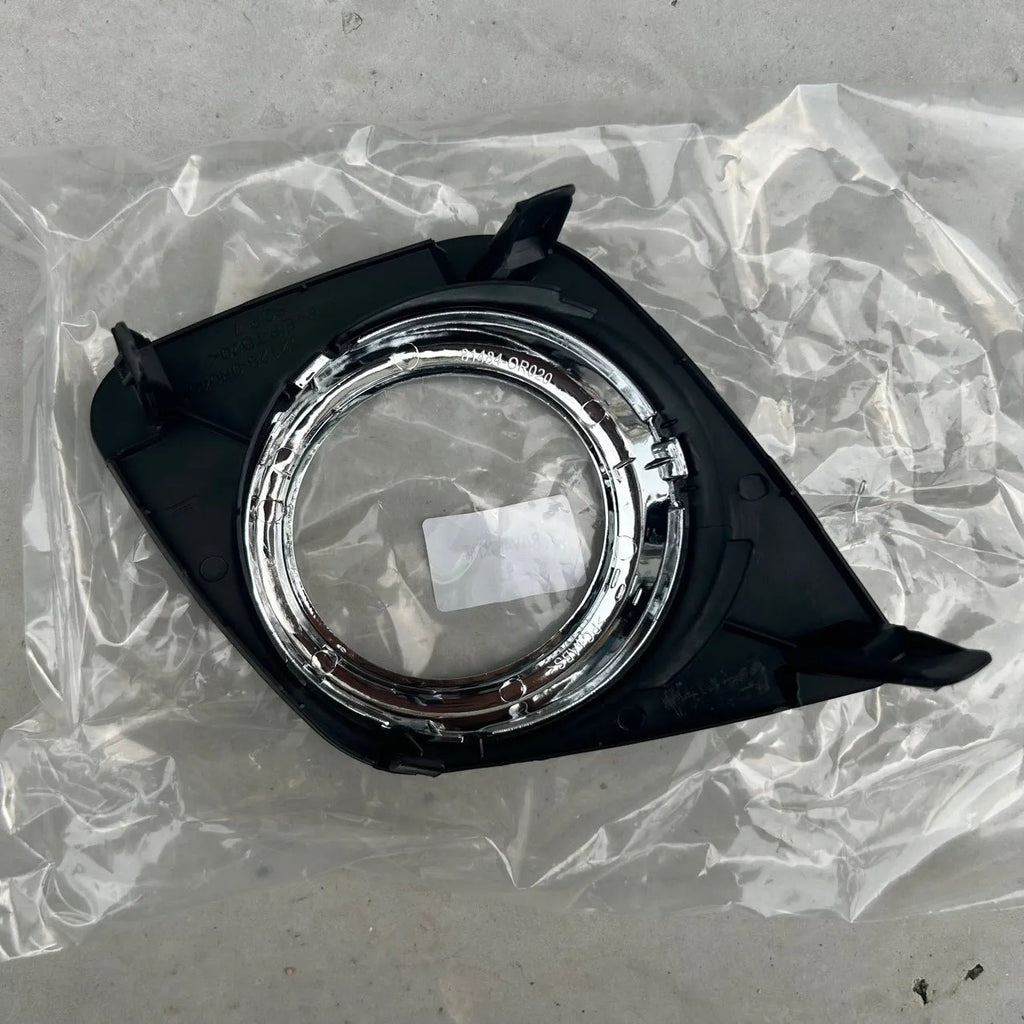 Toyota RAV4 front bumper fog light cover set showing both driver and passenger side black replacement pieces