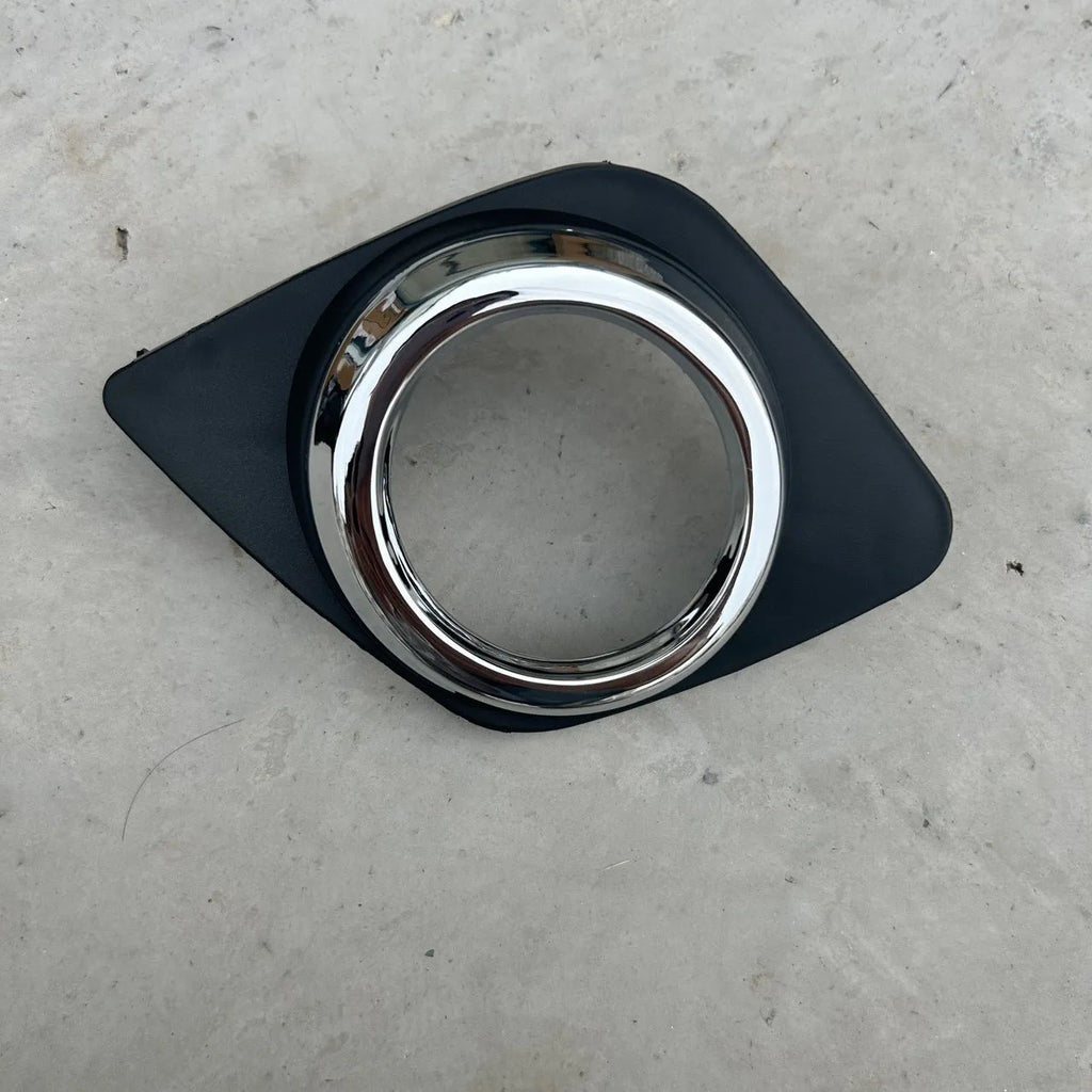 Toyota RAV4 front bumper fog light cover set showing both driver and passenger side black replacement pieces