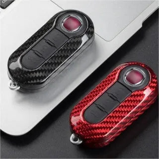 Carbon fibre and glass fibre replacement shell for a car key fob in Black, Red, and Silver Black colour options.