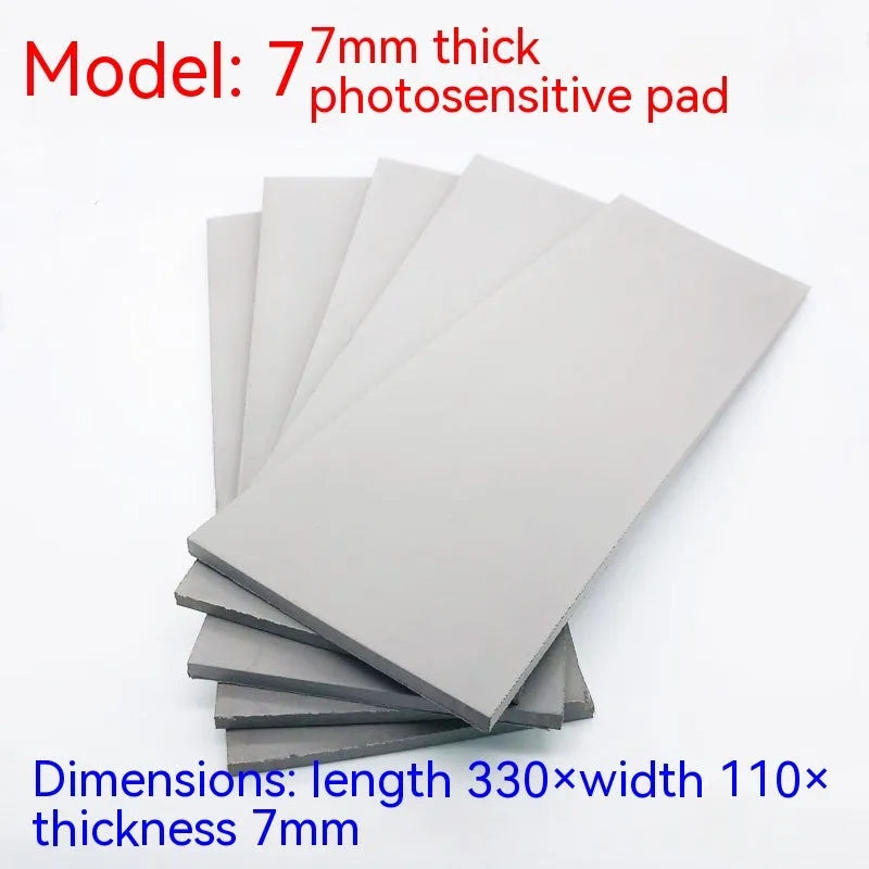 Black and grey plastic light-sensitive mat for seal making, shown in 7mm, 4mm, and 2mm thickness options.