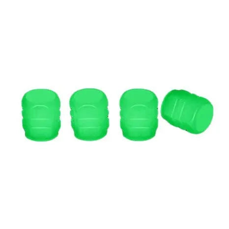 Luminous rubber tyre valve caps showing split design and available glow colours