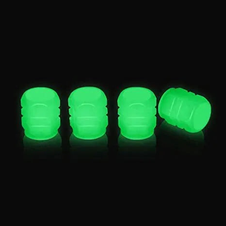 Luminous rubber tyre valve caps showing split design and available glow colours