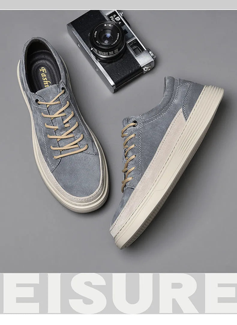Men's casual leather skate shoes in grey colour with round toe and lace-up front