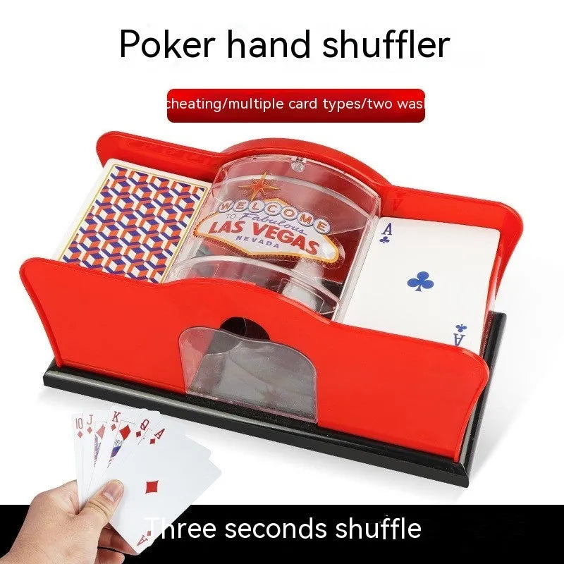 Manual card shuffler with hand crank mechanism on table with playing cards