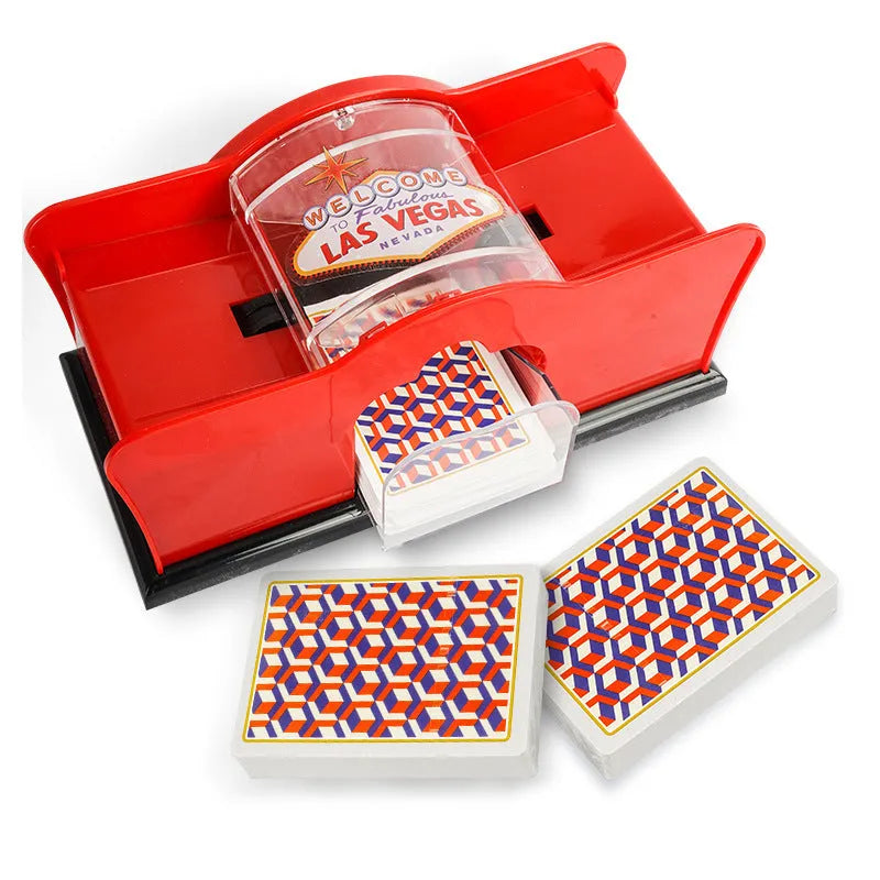 Manual card shuffler with hand crank mechanism on table with playing cards