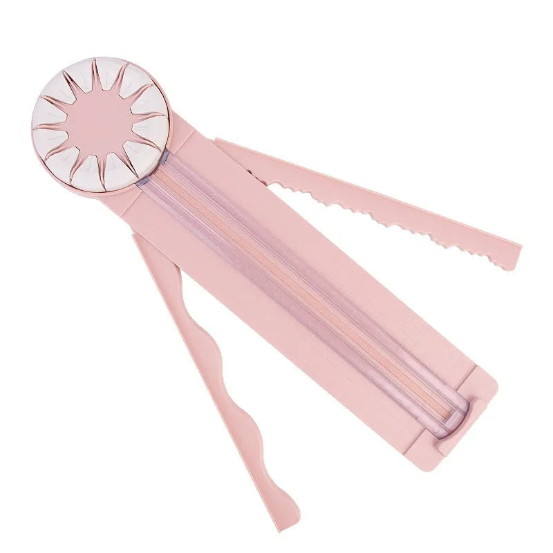 Pink and black 12-in-1 plastic paper cutting machine with dotted guides for A4 paper