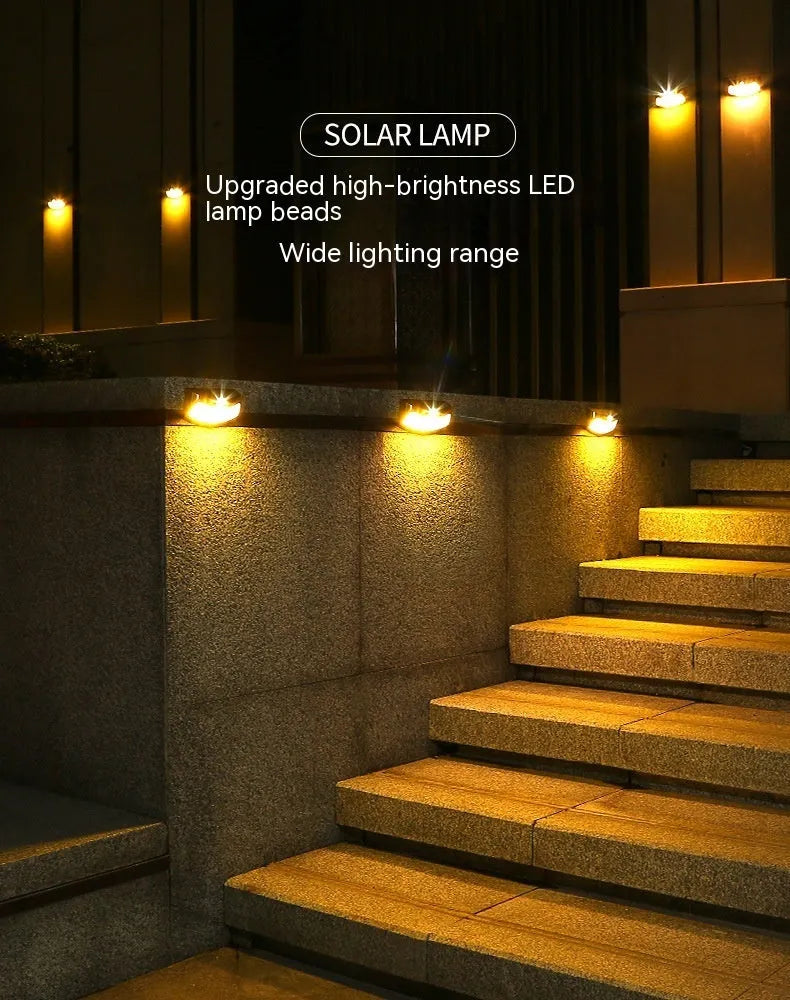 Solar outdoor wall lamp with decorative smiling face design for garden and courtyard lighting