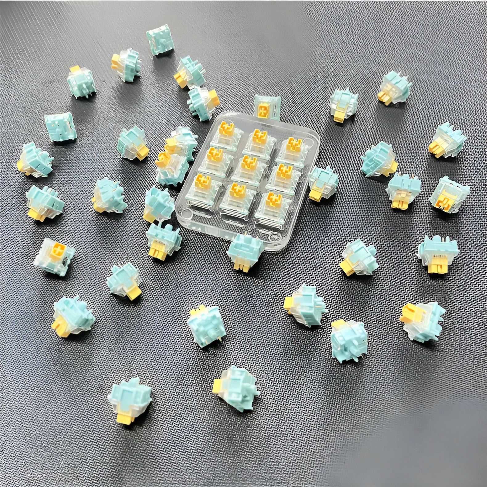 36 pale lemon-yellow Tiger Mo Sea Salt Lemon PRO Mute mechanical keyboard switches laid out.