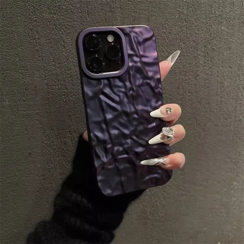 Tin foil pleated silicone phone case for Apple iPhone showing embossed texture