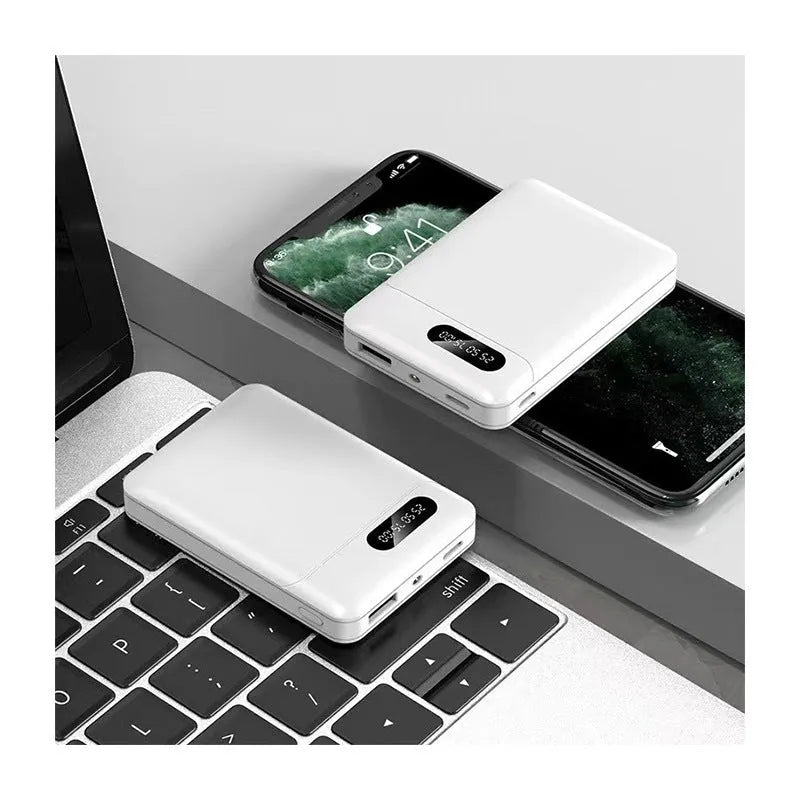 Black or white portable power bank with dual USB ports showing capacity options