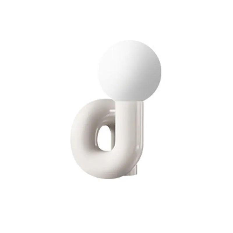 Modern Nordic style resin bedside lamp in pink with international plug adapter options