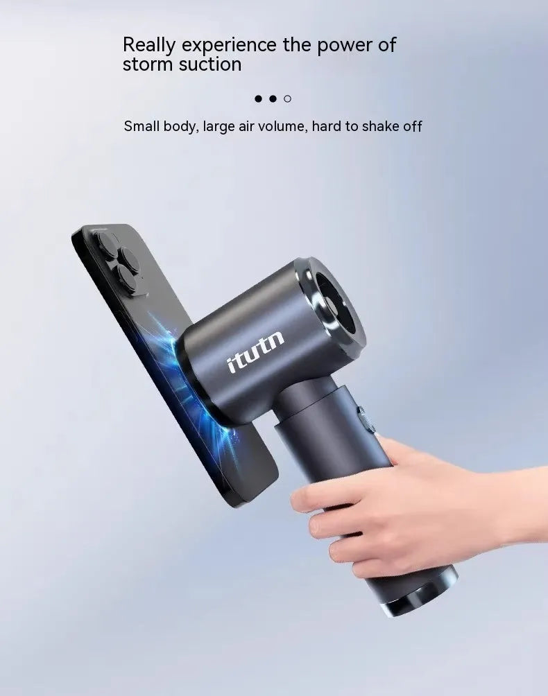 Handheld wireless car vacuum cleaner in space-like grey colour with blowing and suction functions