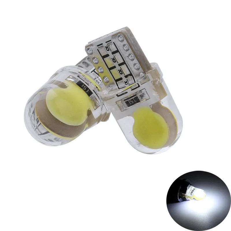 Pack of ten T10 wedge base LED bulbs for cars in seven different colours on a white background