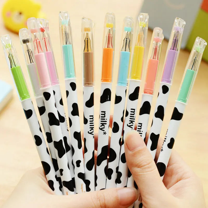 Box of 12 cow print gel pens with 0.38mm fine tips in assorted colours.