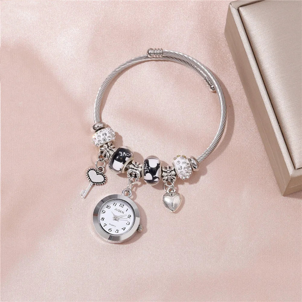 Women's bangle quartz watch with love heart key pendant, alloy strap, 2.1 cm dial, black colour