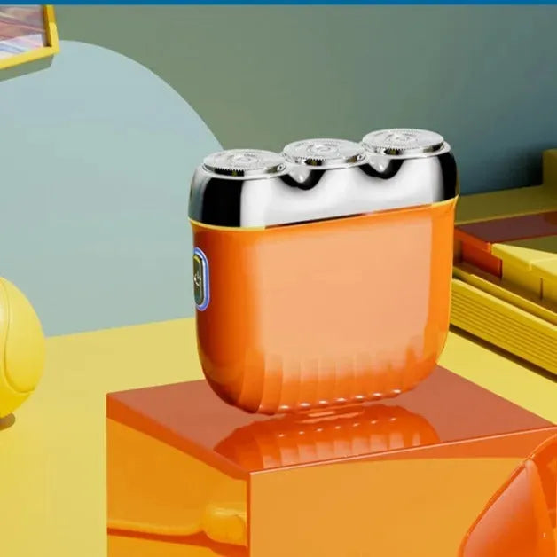 Mini electric shaver with three floating cutter heads in gun colour option