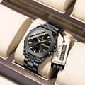 Men's slim stainless steel quartz watch on wrist showing gold and blue colour variant.