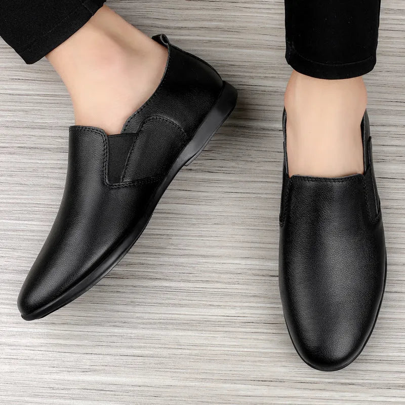 Men's black leather round toe business casual shoes on a white background