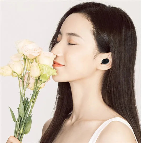 M1 Bluetooth wireless stereo headset in black or white colour with earbud design